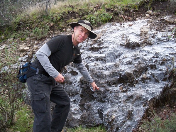 Jay looks at ice at Sandstone Peak